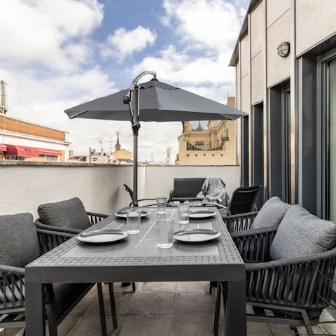 Savour drinks and tapas on the private balcony