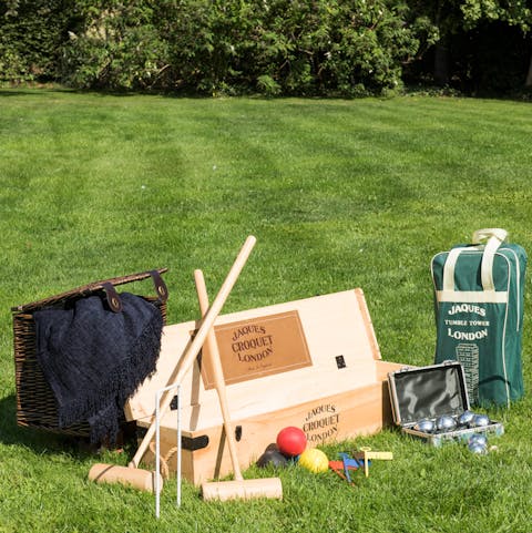 Challenge the family to a game of croquet in the beautiful garden