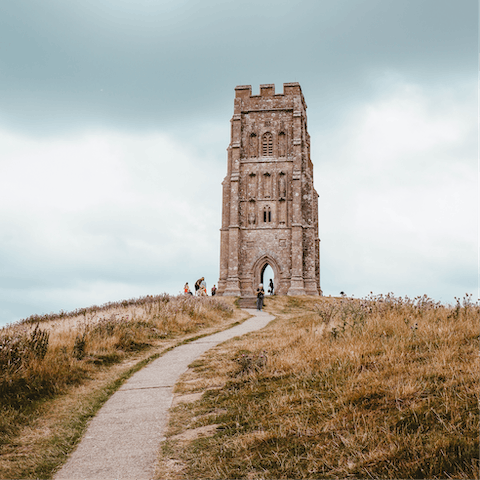 Witness amazing views of Somerset from Glastonbury tor (a twenty-minute drive)