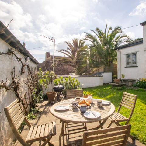 Dine alfresco in your sunny walled garden