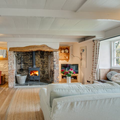 Warm up in front of your cosy wood burner after a day out exploring
