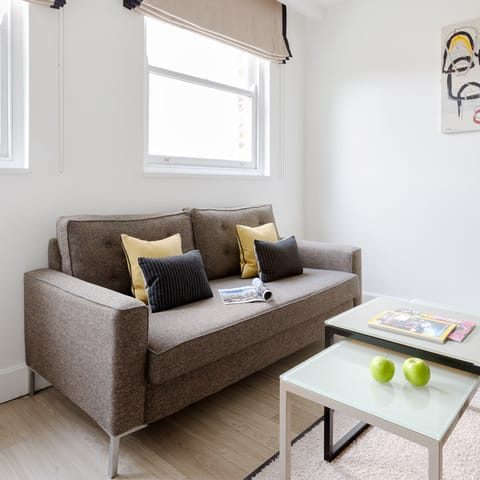 Kick back after a busy day on the comfortable, modern furniture