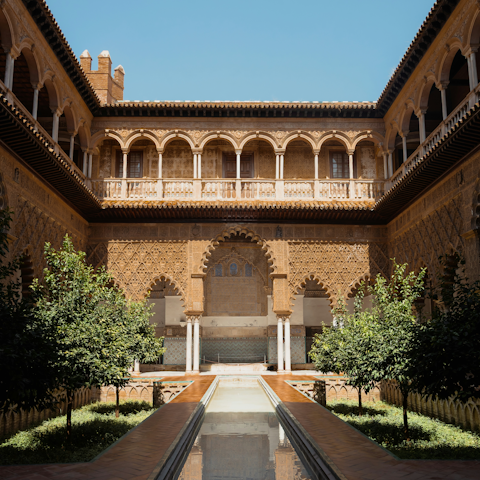 Stay just steps away from the regal Real Alcázar