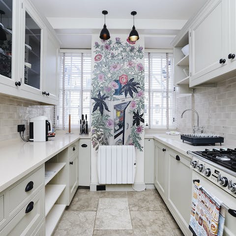 Prepare home-cooked meals in the charming kitchen