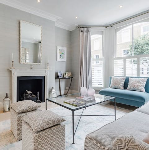 Revel in the many period features, such as the fireplace and bay windows