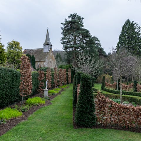 Stroll around the shared grounds, including the thirteen acre meadow