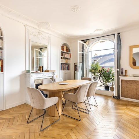 Enjoy a classic Parisian breakfast by the big bay windows