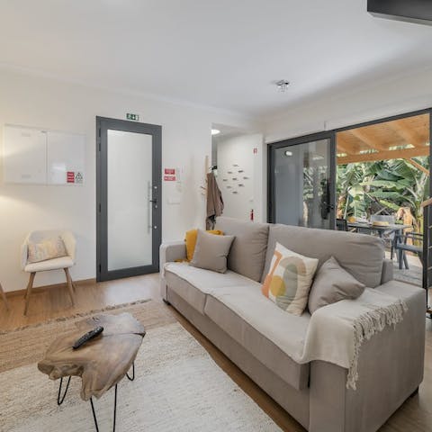 Relax with a good book in the calming living space