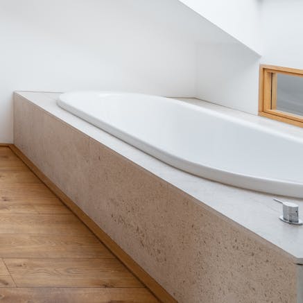 Enjoy a long, hot soak in the master bedroom's bathtub