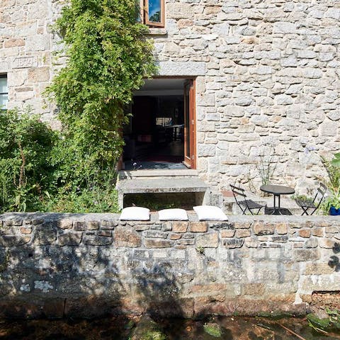 Sit out by the babbling brook with a glass of your favourite drop