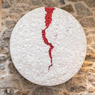 Admire the local artwork proudly displayed within the property
