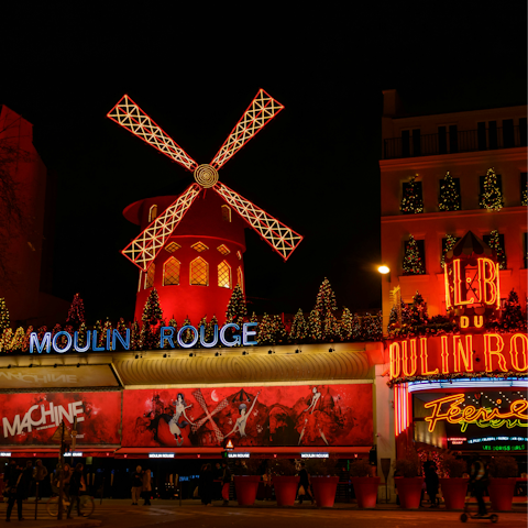 Discover Paris' famous cabaret, Moulin Rouge, just a 5-minute walk away