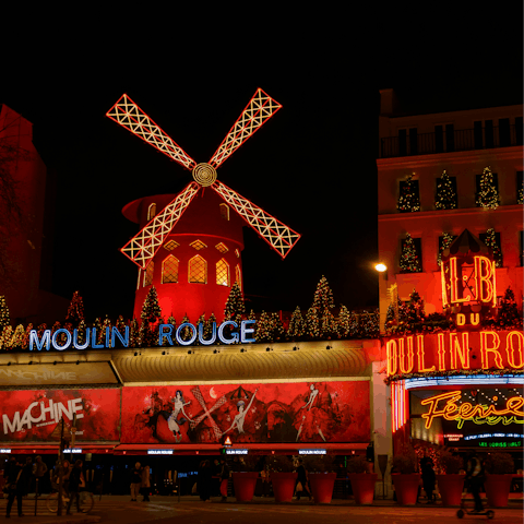Discover Paris' famous cabaret, Moulin Rouge, just a 5-minute walk away