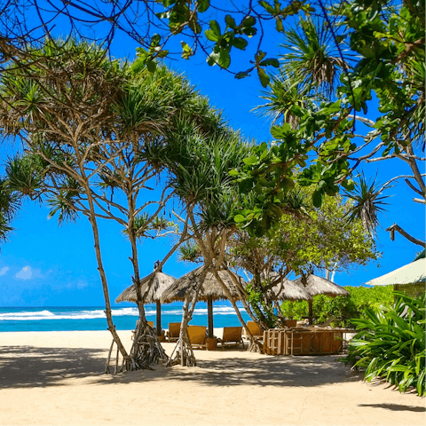 Paddle in the surf of Berawa Beach – it's 1.4 kilometres away