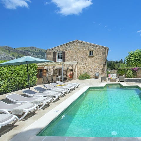 Lounge in the sun by the pool and enjoy the tranquillity of your garden