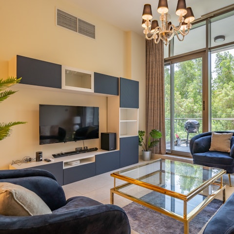 Put on a movie and relax together in the plush living room