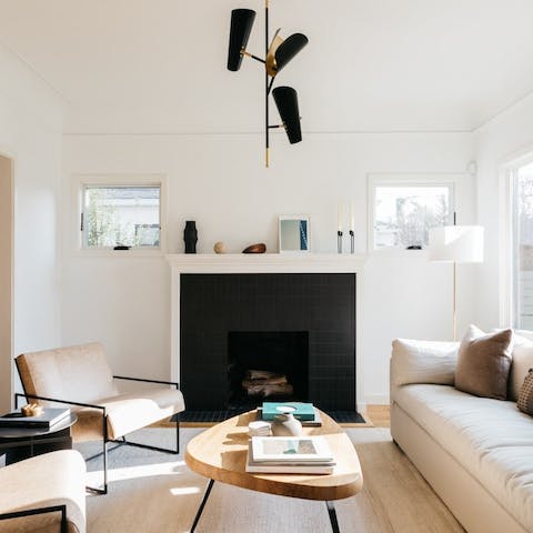 Gather around the statement fireplace for games after dinner