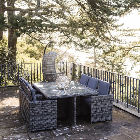 Relax on the huge balcony surrounded by trees