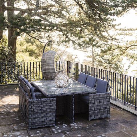 Relax on the huge balcony surrounded by trees