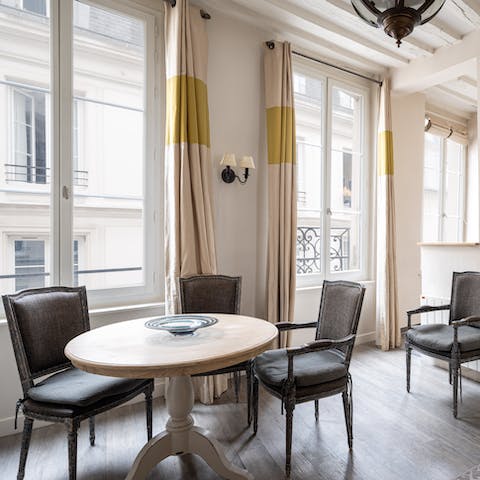 Enjoy plenty of natural light from the typically Parisian windows