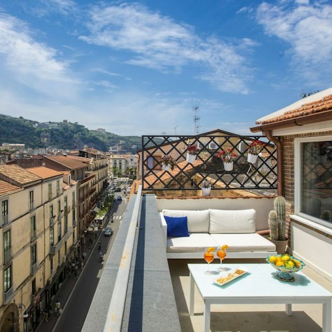 Sip limoncello while admiring the bustling Corso Italia