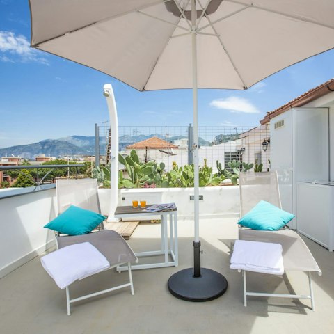 Sprawl out on the private terrace's sun loungers
