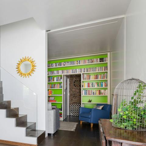 Snuggle up with a good book in the cosy reading room