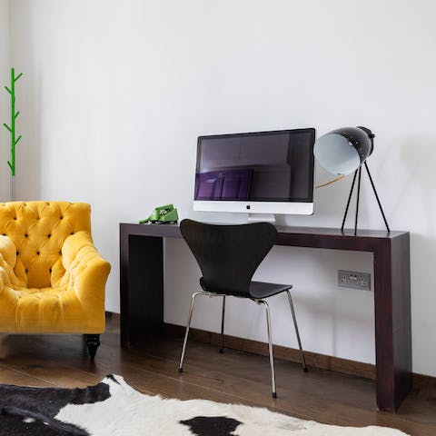 Catch up on work at the desk space