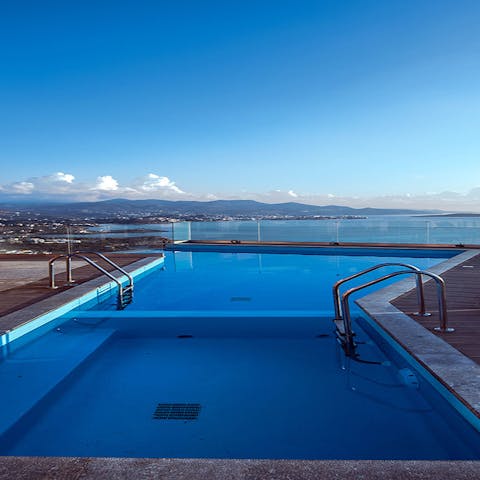 Take a dip in the infinity swimming pool and watch the boats glide past