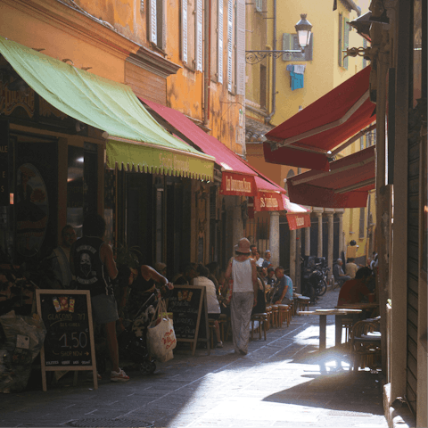 Explore cobbled streets and authentic eateries in the old town, a ten-minute walk away