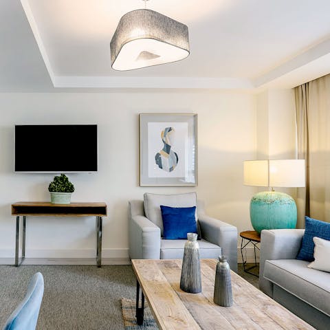 Unwind in this snug area and chat about your adventures around the coffee table