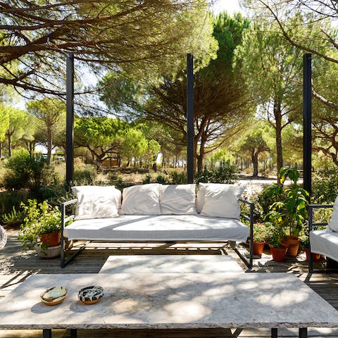 Enjoy a glass of something sparkling in the alfresco seating area
