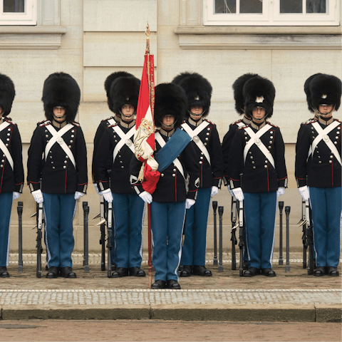 Witness the Changing of the Royal Guard at nearby Amalienborg Palace