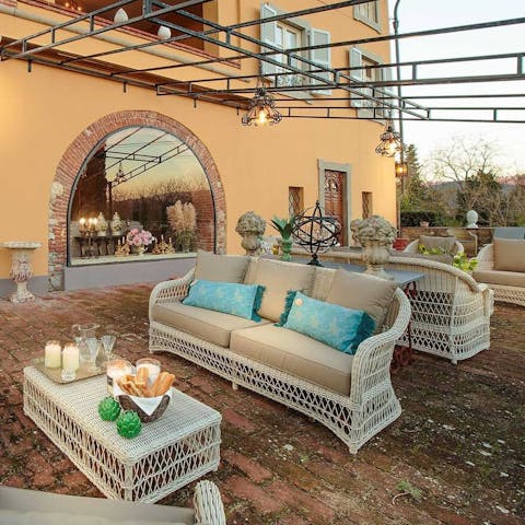 Sip sundowners on the atmospheric terrace