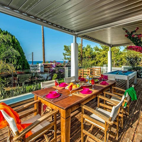 Dine or unwind on the shaded terrace or enjoy a game of pool