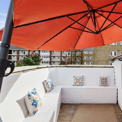 Relax with an evening aperitif on the sun-kissed rooftop terrace