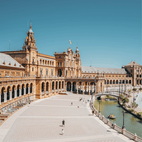 Visit the spectacular Plaza de España, a couple of kilometres south