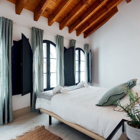 Open up the wooden shutters and let the light flood in each morning