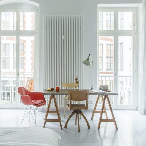 Catch up on work at the sunny artist's desk