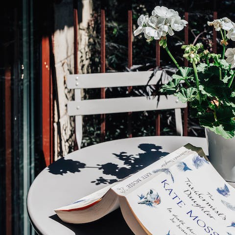 Get stuck into your book on the balcony