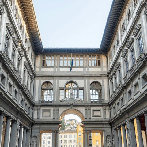 Visit the iconic Uffizi Gallery, fifteen minutes away