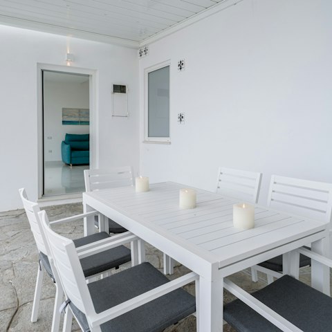 Gather around the outdoor table for alfresco dinners