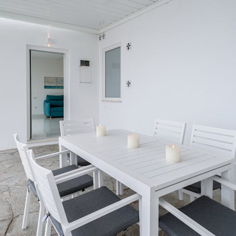 Gather around the outdoor table for alfresco dinners