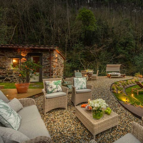 Soak up the golden sun on the terrace, a glass of wine in hand