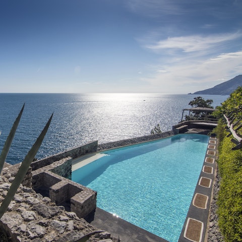 Gaze out to sea while swimming in the saltwater pool