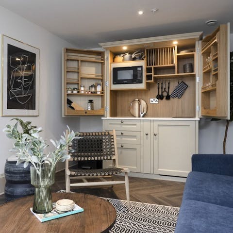 Cook in the petite kitchenette or dine out in New Town