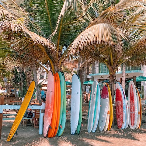 Try your hand at surfing or bodyboarding at the Lagoa de Óbidos, a short drive away