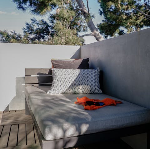 Catch some sun rays on the terrace