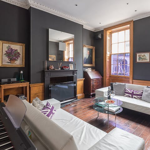 The dark colour palette of the walls