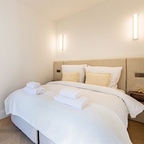 Snooze in the comfortable bed after a day of sightseeing in the capital